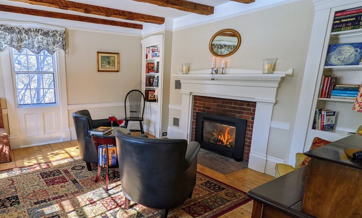 Parlor and fireplace at Coach Stop Inn