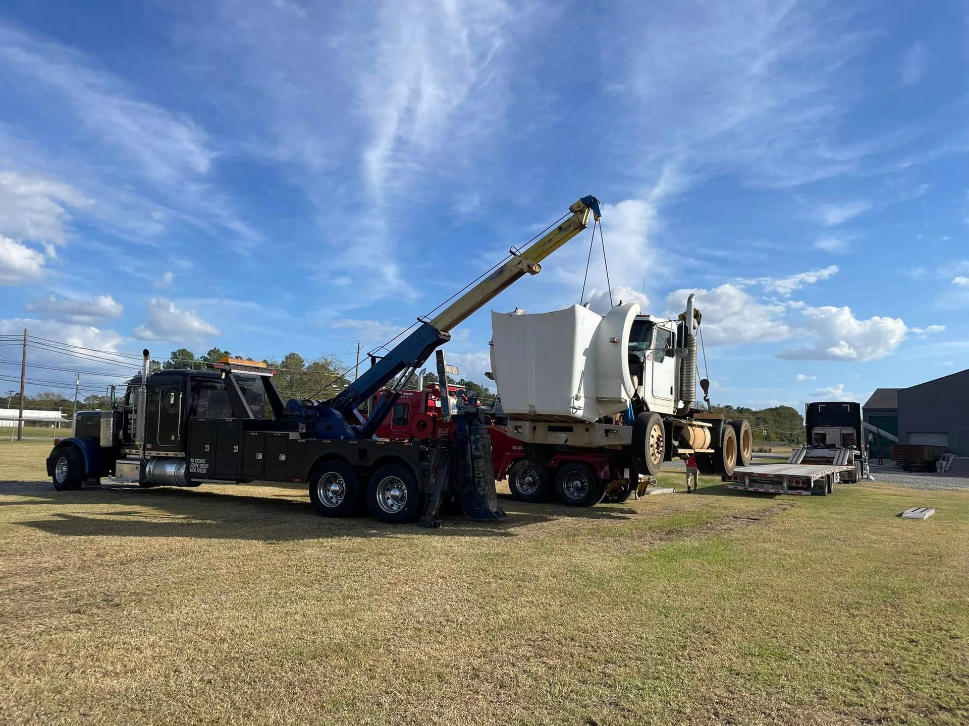 Tow truck carrying materials 