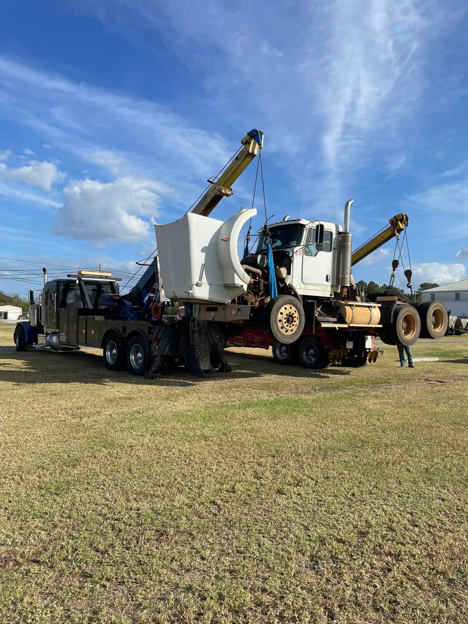 Tow truck carrying materials 