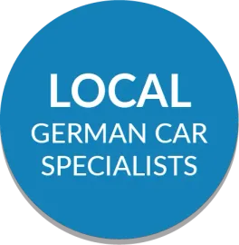 A blue circle with the words `` local garage near you '' on it