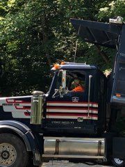 Man Driving A Truck — Porter Corners, NY — Adirondack Paving