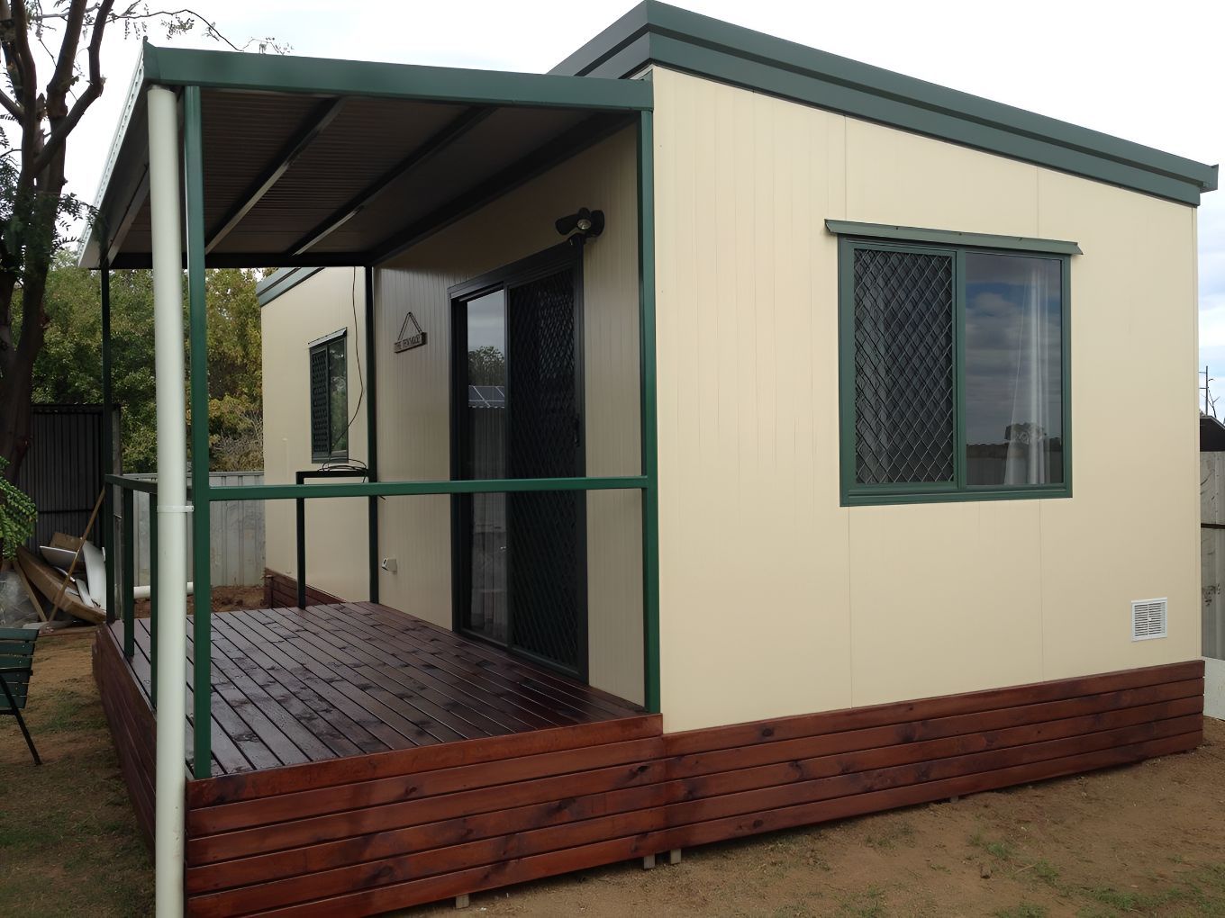 A Small House With a Porch and a Window — OSM Transportables In Coolah, NSW