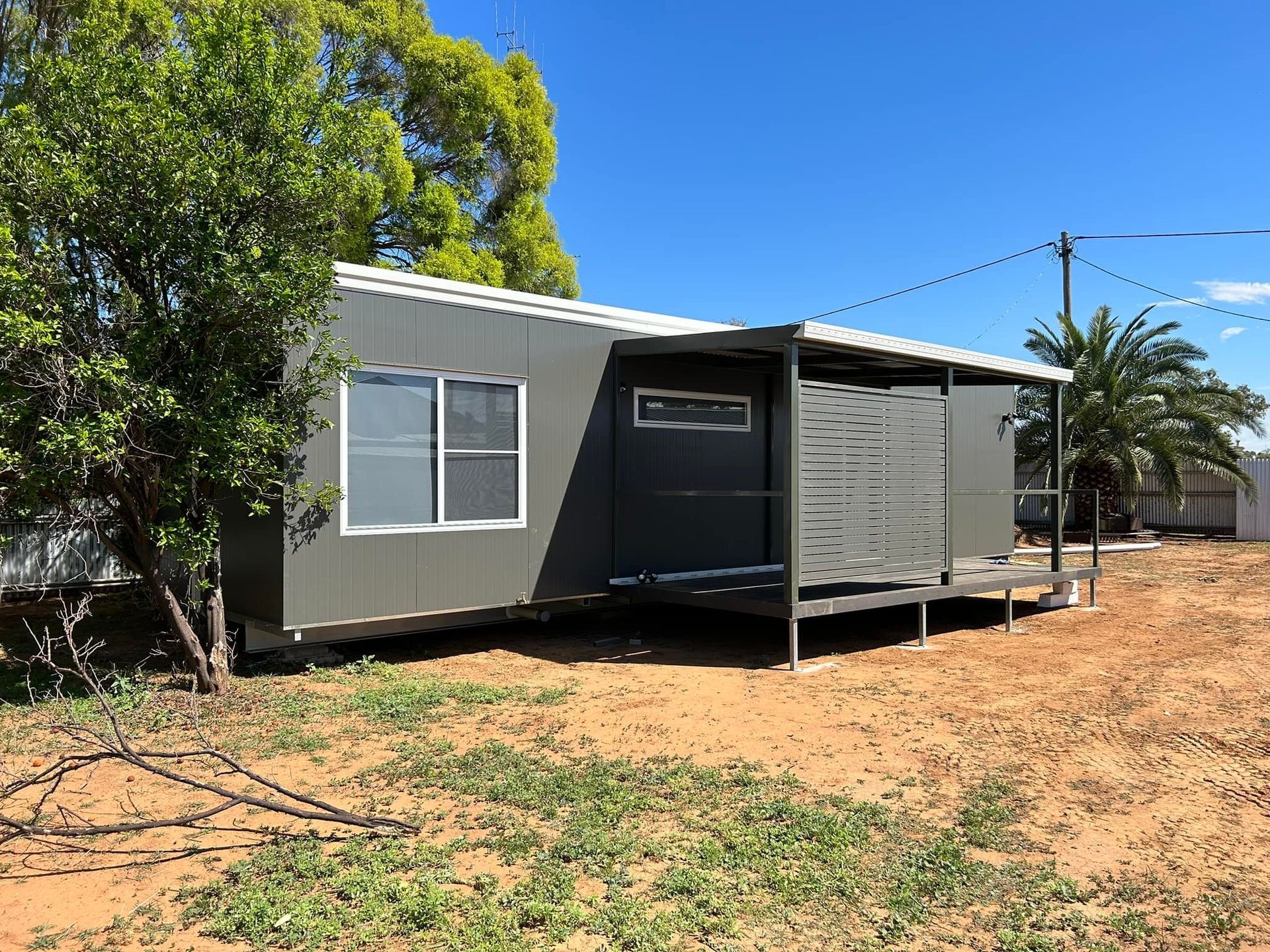 Contemporary Black Portable House, Offering Modern Design and Functionality — OSM Transportables In Dubbo, NSW