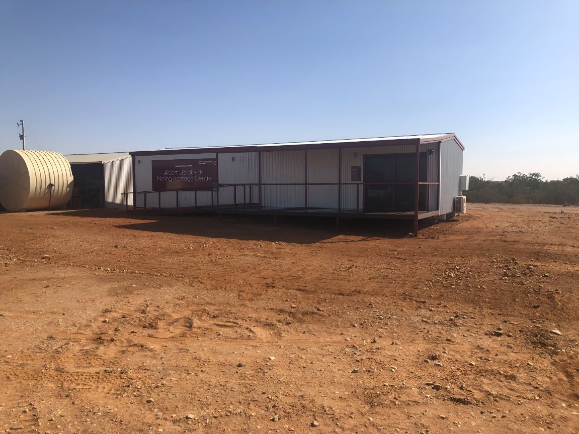 A Large Building is Sitting in the Middle of a Dirt Field — OSM Transportables In Cobar, NSW