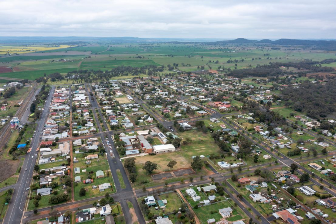 An Aerial View of a Small Town Surrounded by Fields and Trees — OSM Transportables In Dunedoo, NSW
