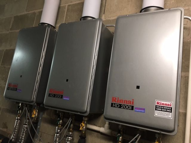 A close-up of commercial plumbing board installed on walls — VR Marsden Plumbing in Red Rock, NSW