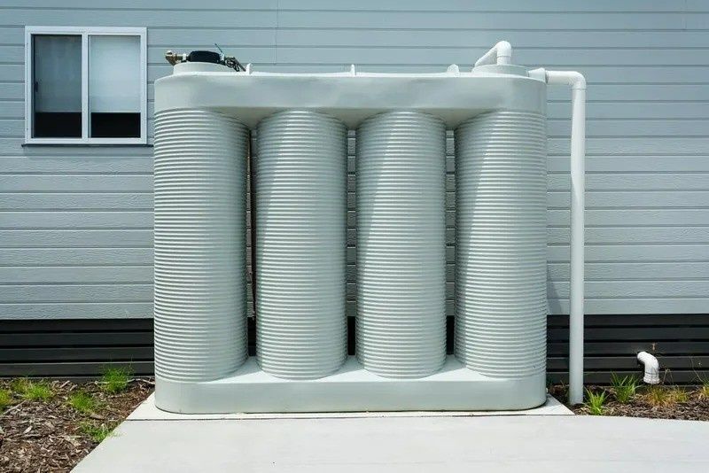Gray Water Tank With Four Vertical Columns — VR Marsden Plumbing in Red Rock, NSW