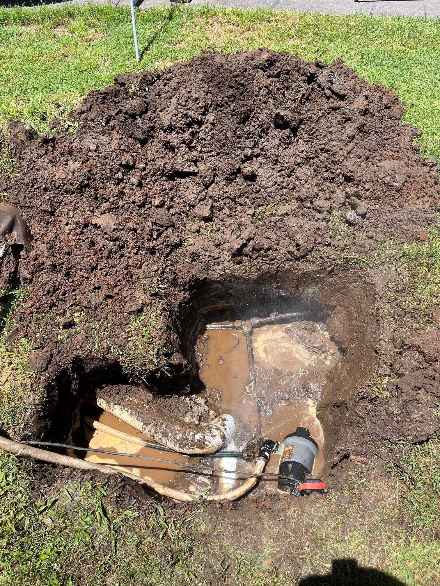 An underground leak has been discovered while surrounded by dirt — VR Marsden Plumbing in Red Rock, NSW