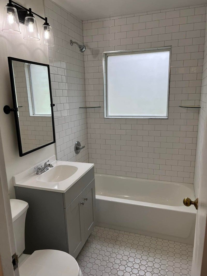 A Bathroom with Sink with Gray Cabinet | Louisville, KY | Archer Services