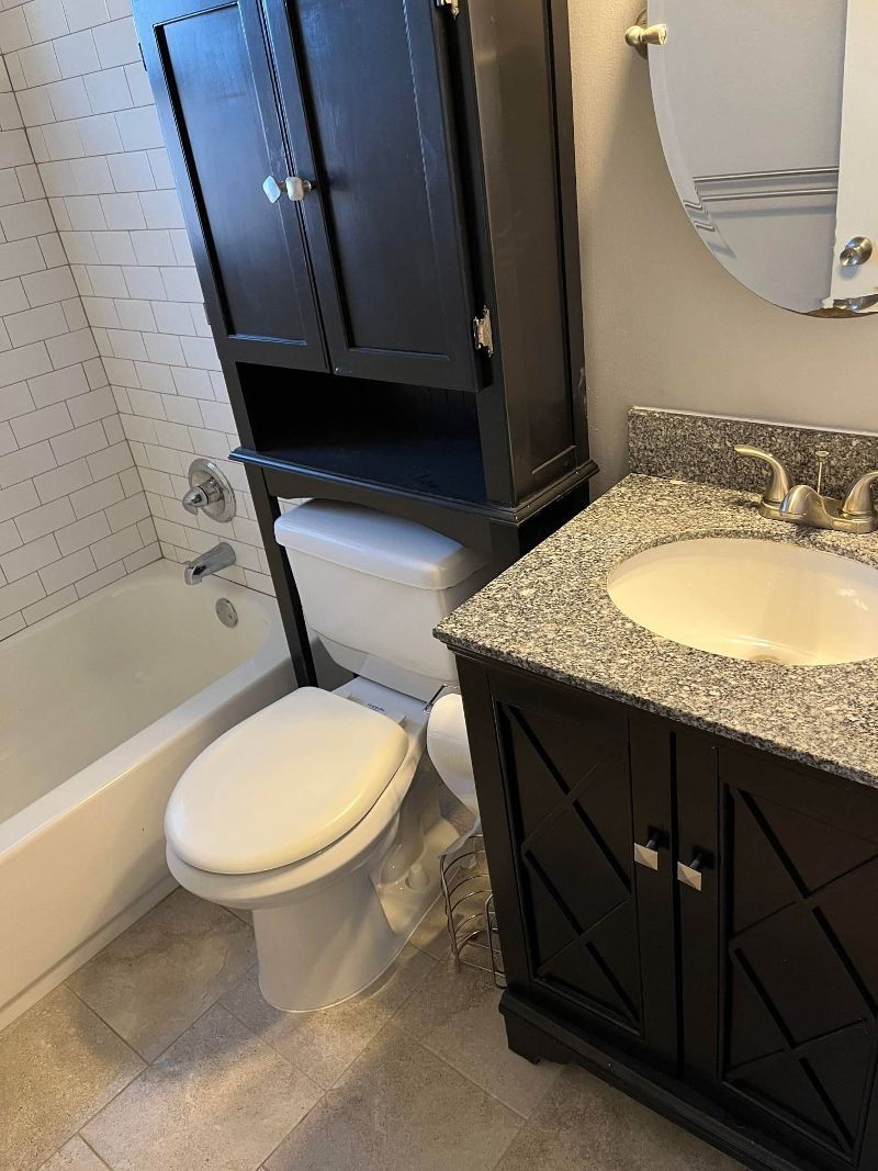 A Bathroom with Sink with Black Cabinet | Louisville, KY | Archer Services