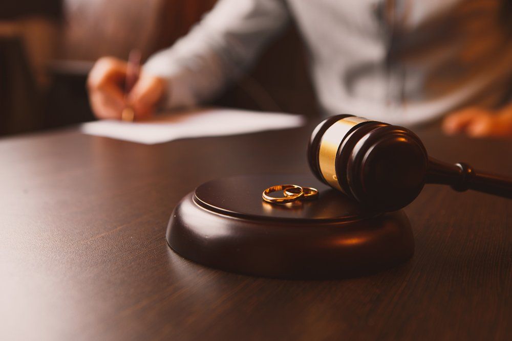 A Man Signing Legal Papers, Divorce Baton Rouge LA
