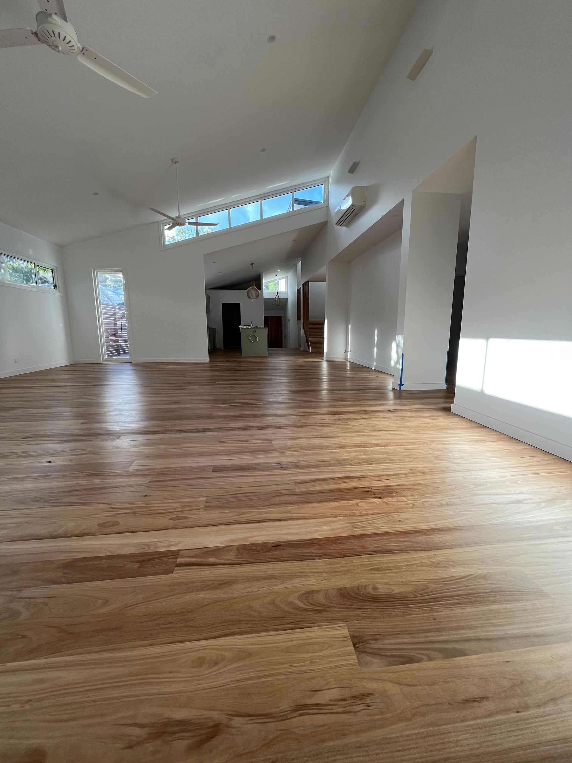 An Open Living Space With no furniture — Hart Projects Wollongong In Shellharbour, NSW