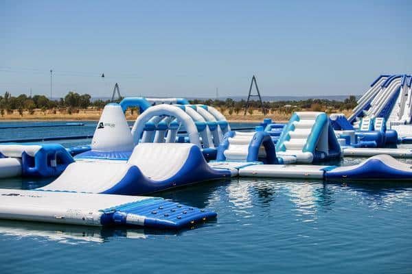 Blue and White Colored Inflatable Obstacles — Zen Luxury Retreats in Darwin City, NT