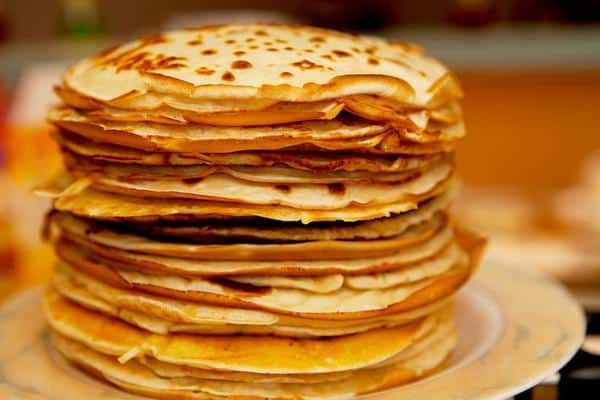 A Stack of Pancakes on A White Plate — Zen Luxury Retreats in Darwin City, NT