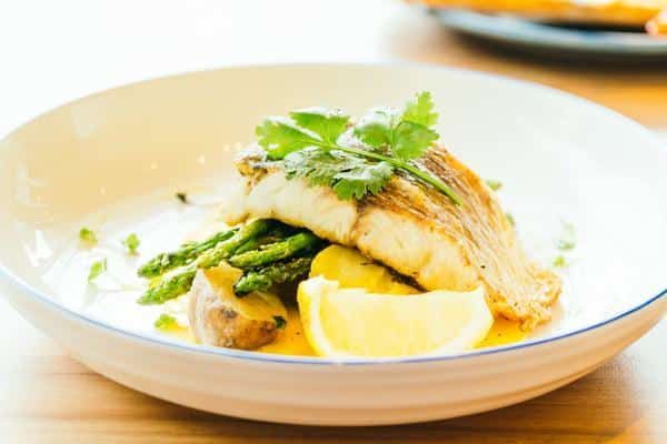 Grilled Barramundi Meat Steak With Vegetable and Lemon — Zen Luxury Retreats in Darwin City, NT