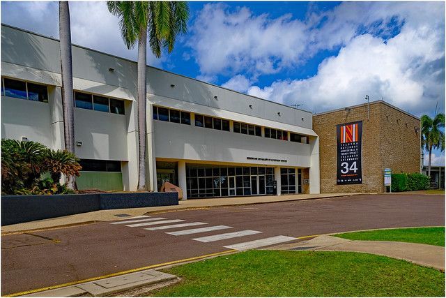 A Large Building with A Sign that Says N on It — Zen Luxury Retreats in Darwin City, NT