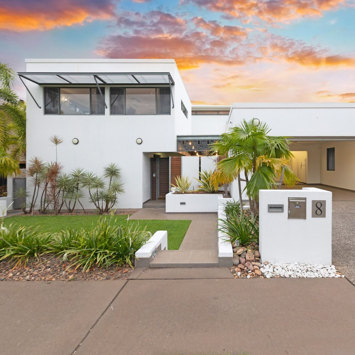 Luxurious White House with a Small Lawn In Front — Zen Luxury Retreats in Darwin City, NT