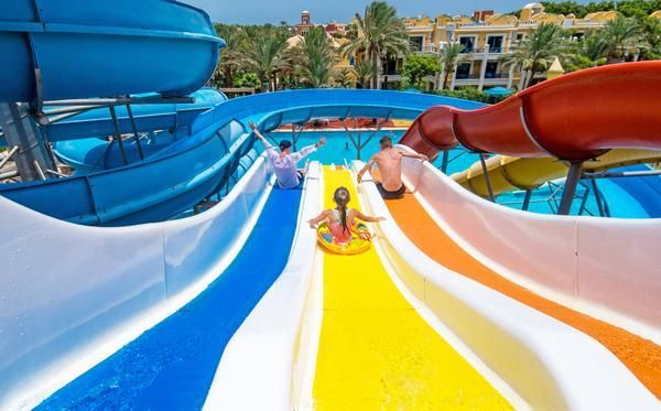 A Family Going Down a Water Slide — Zen Luxury Retreats in Darwin City, NT