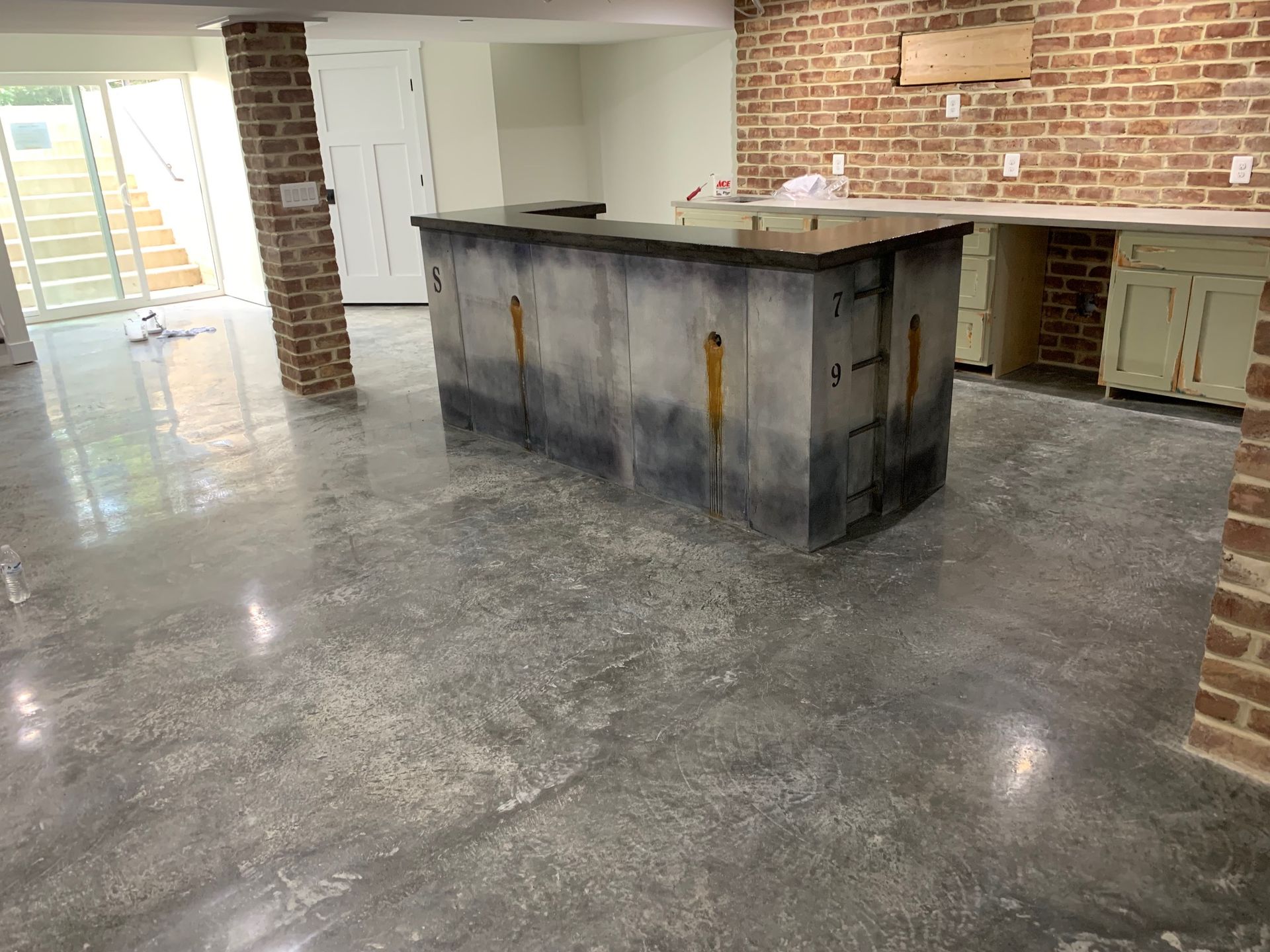 There is a large island in the middle of the room.