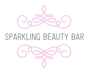 The logo for sparkling beauty bar has a pink swirl on it.