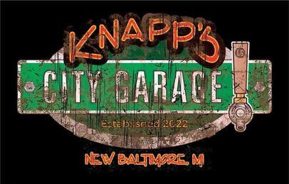 A sign for Knapp's City Garage is on a black background.