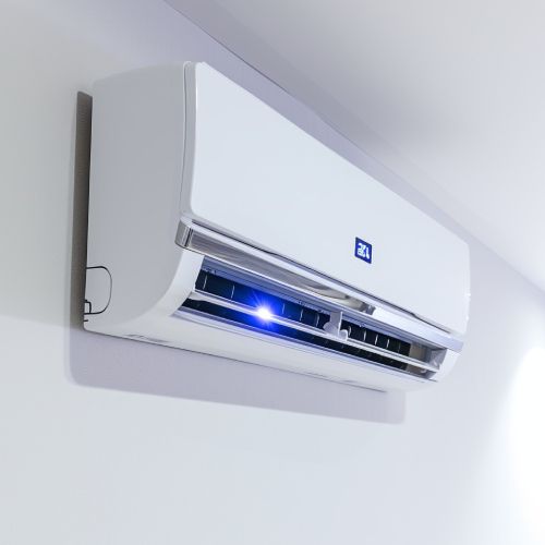 A white air conditioner is hanging on a white wall.