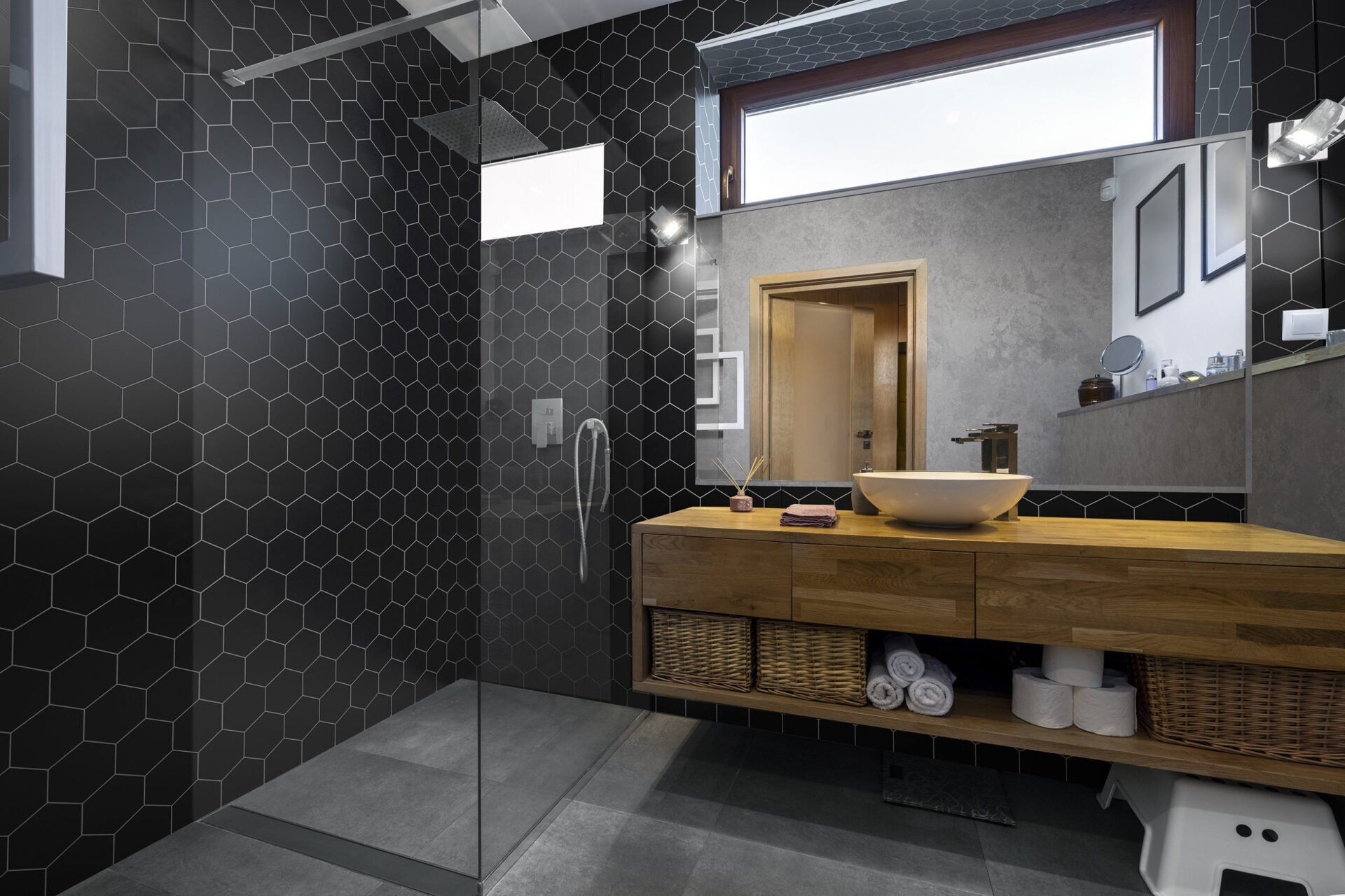geometric shaped black tile bathroom remodel