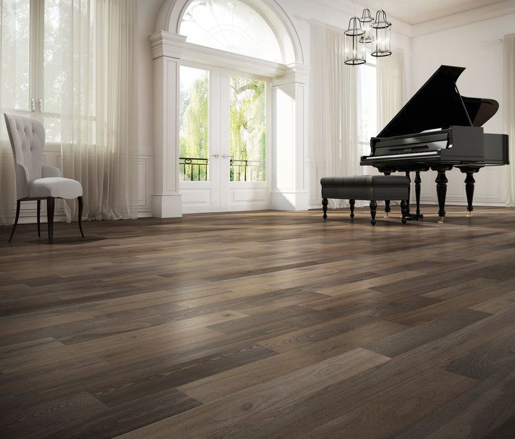 There is a piano in the middle of the room.