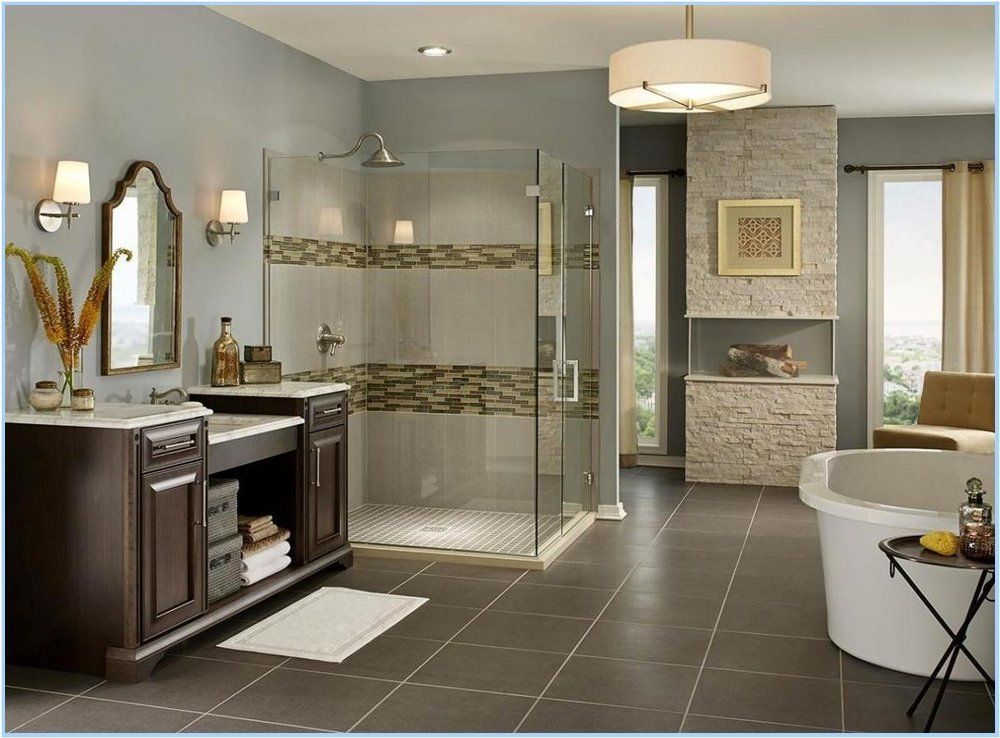 A bathroom with a walk in shower and a bathtub