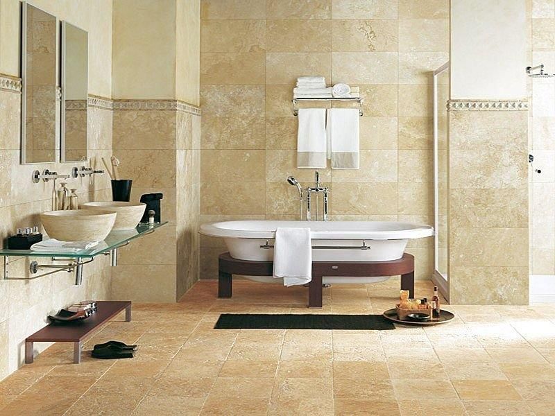 A bathroom with two sinks and a bathtub