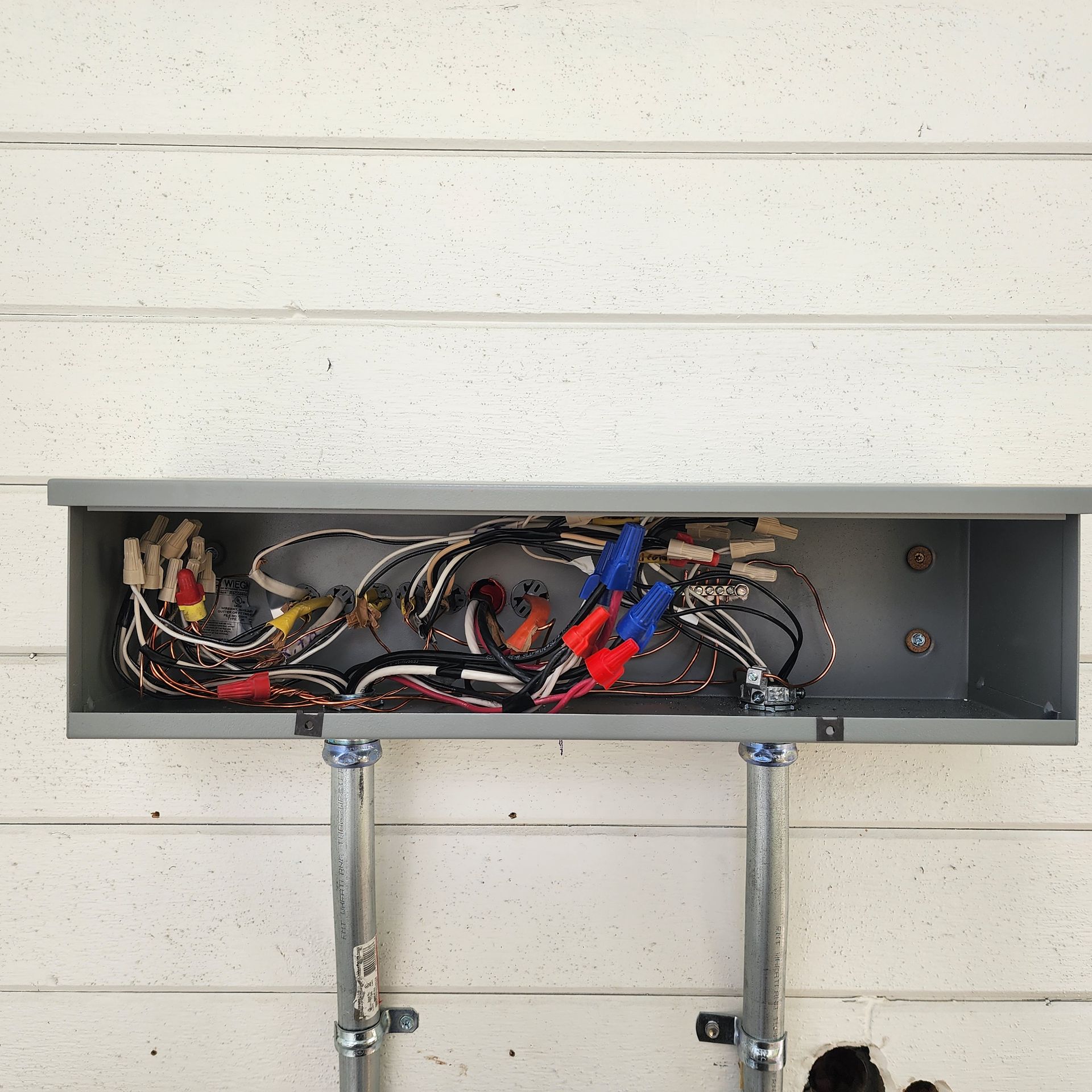 A box with a bunch of wires inside of it