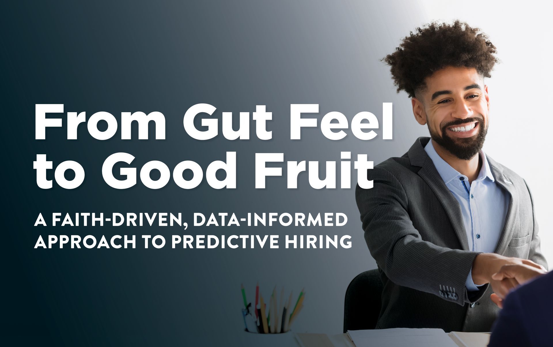 A man smiles and shakes hands. Text reads