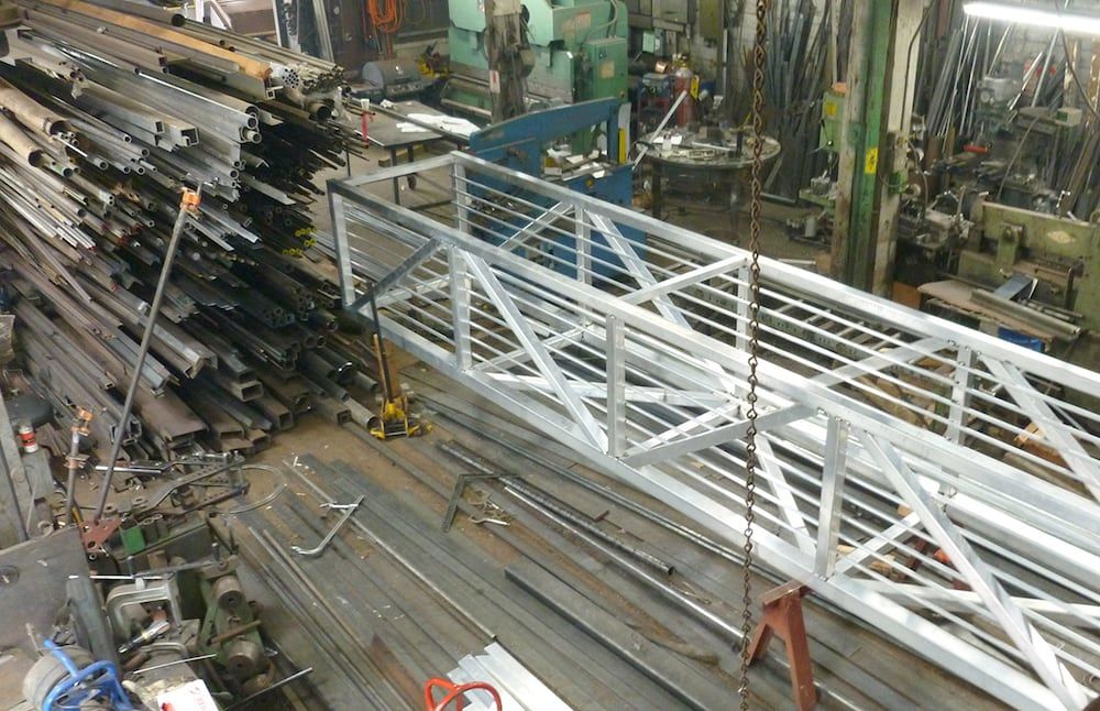 Fabricated structural steel truss assembly in shop environment