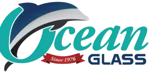 The logo for ocean glass has a dolphin on it.