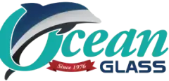 The logo for ocean glass has a dolphin on it.