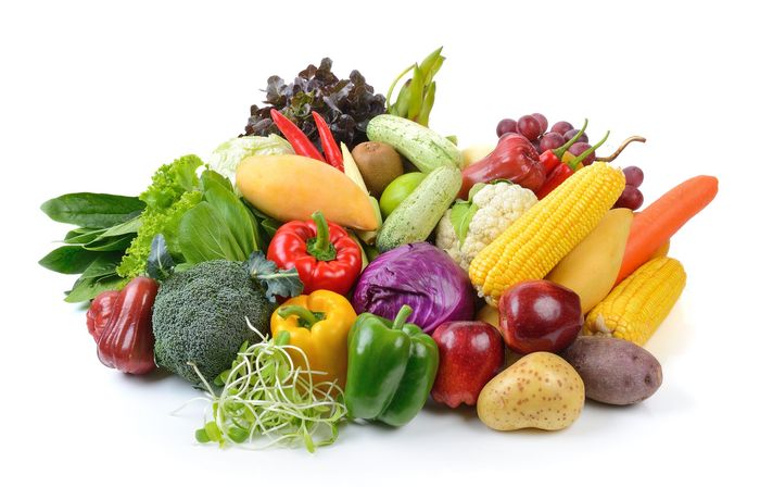 A bunch of fruits and vegetables on a white background