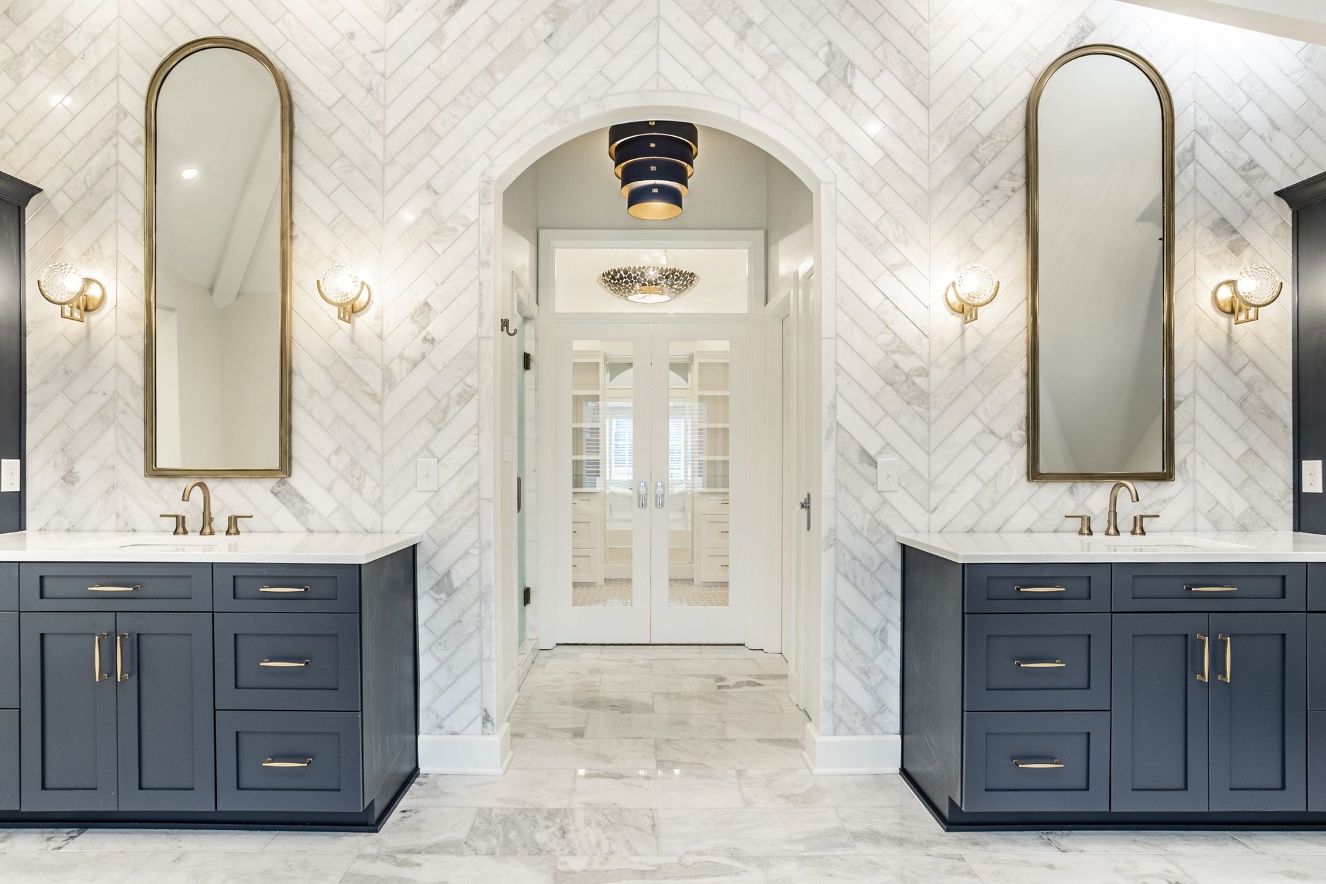 A kitchen with two sinks and a coffee maker