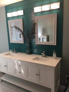 A bathroom with two sinks and two mirrors.