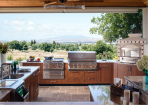 A kitchen with stainless steel appliances and wooden cabinets