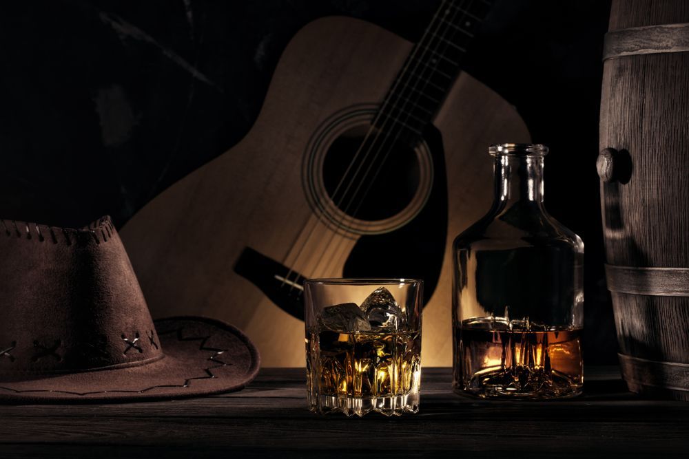 Cowboy Hat, Acoustic Guitar, Whiskey Bottle — BYO Cellars in Nelson Bay, NSW