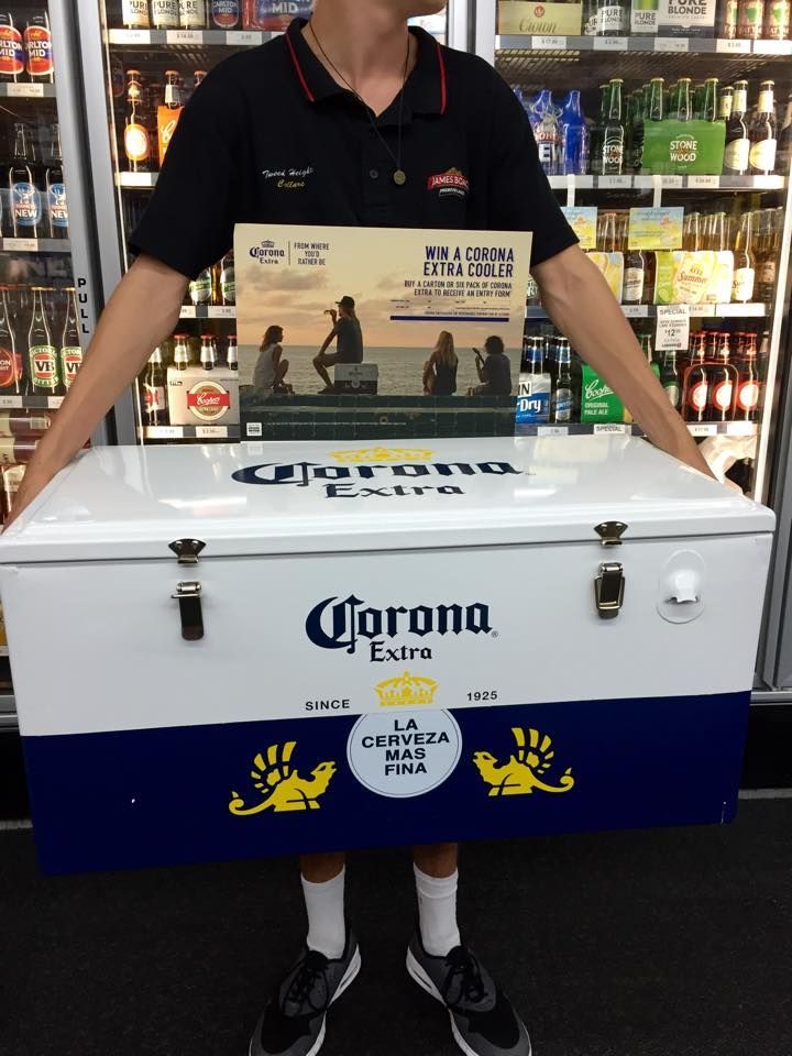 Man holding a Corona Esky Cooler in a Bottle Shop — BYO Cellars