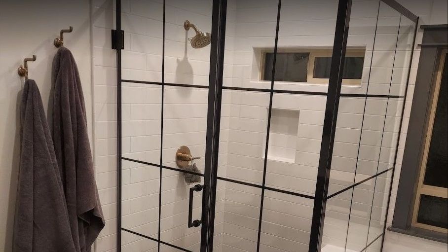 Tile walk-in shower with custom glass and fixtures - bathroom remodel ideas