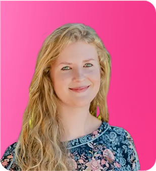 A woman with long blonde hair is smiling in front of a pink background.