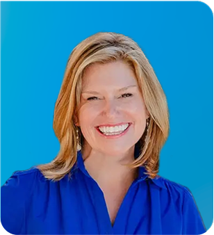 A headshot of a woman in a blue shirt.