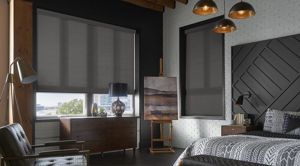 A bedroom with a bed , chair , dresser and painting on the wall.