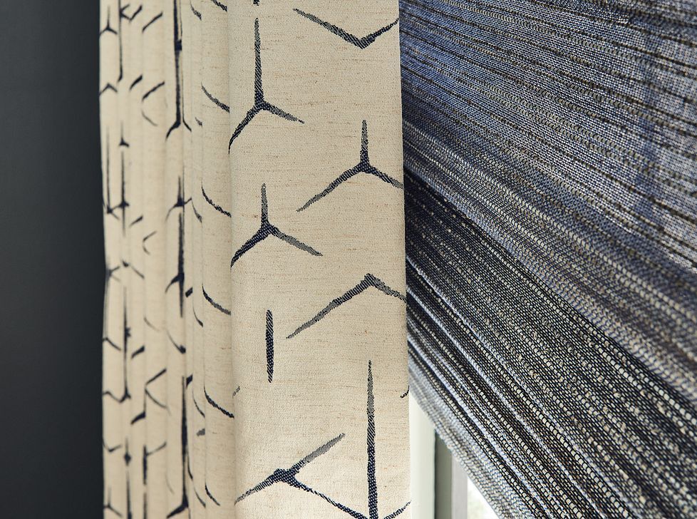 A close up of a curtain with a pattern on it