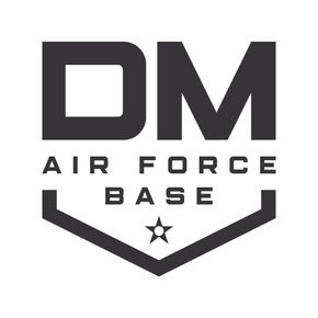 Logo for Davis-Monthan Air Force Base: "DM" in bold text above "AIR FORCE BASE" inside a shield with a star.