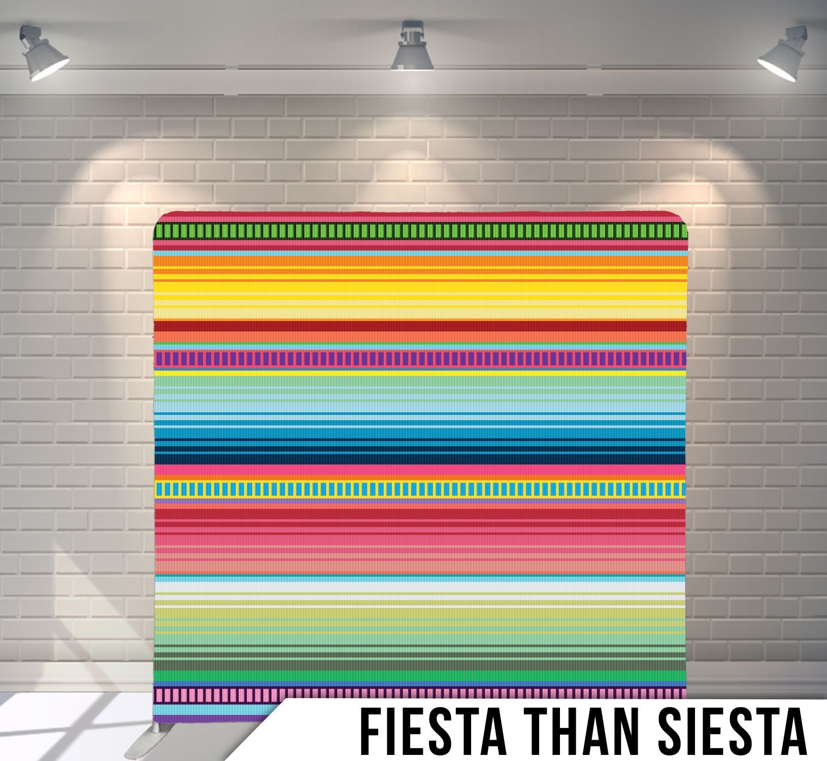 Colorful striped fabric backdrop lit by spotlights; 