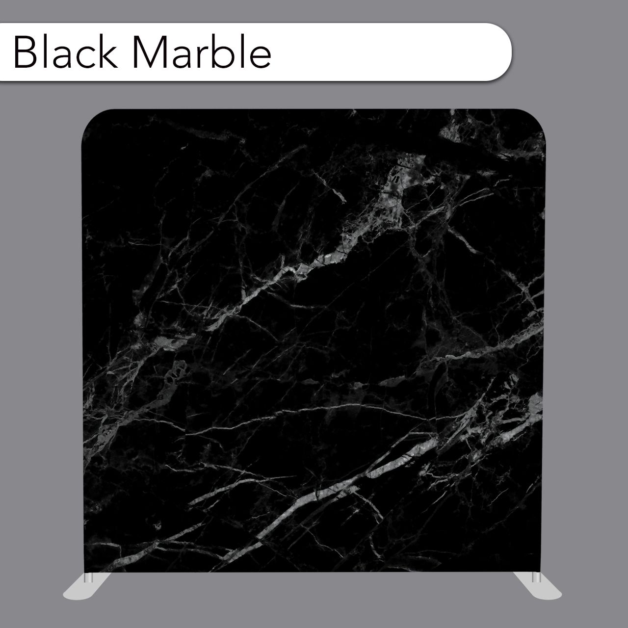 Black marble patterned backdrop on a gray stand.