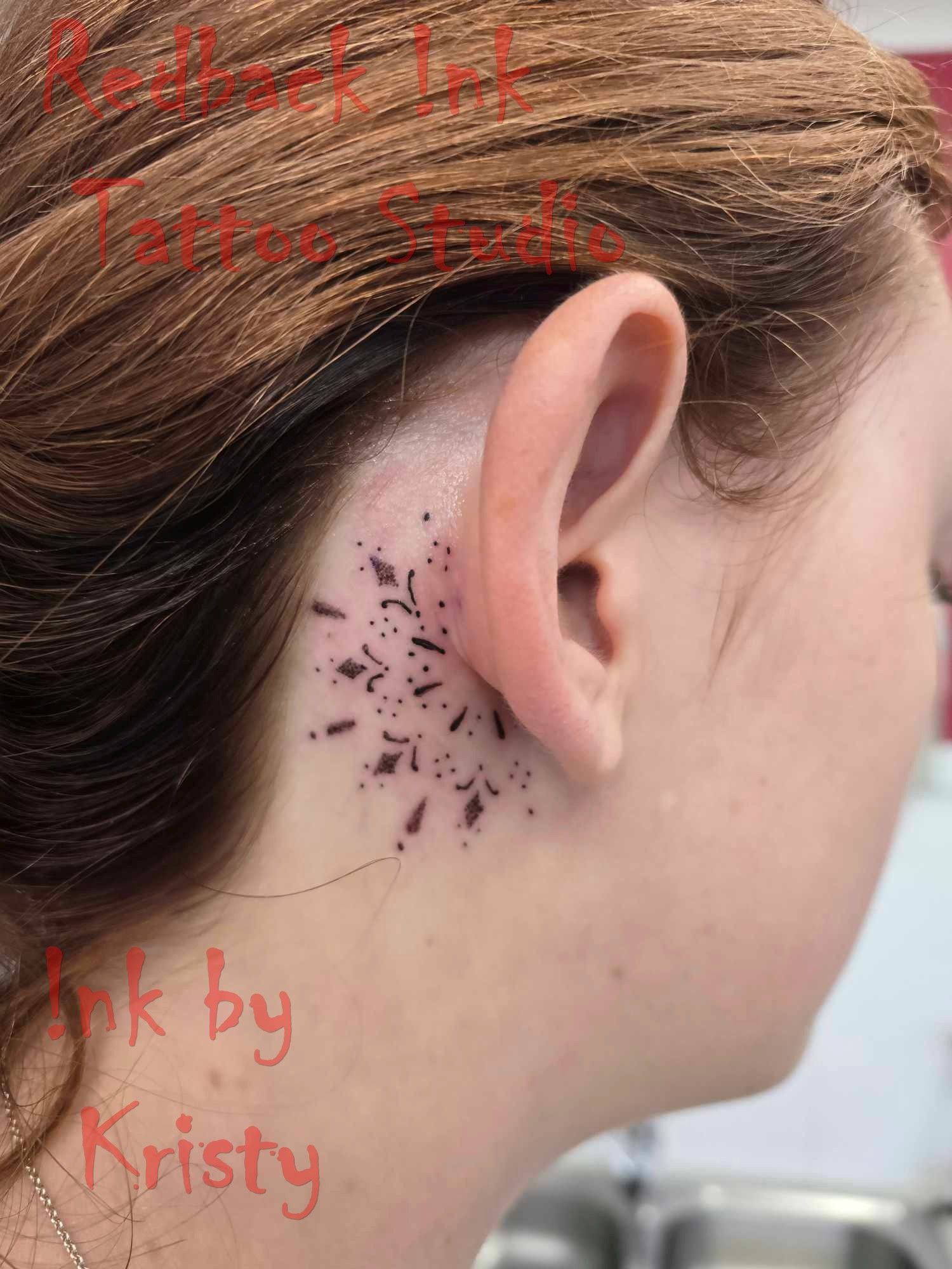 Tattoo Behind a Person's Ear, With Black Geometric Shapes. Red Hair, Fair Skin — Redback !nk Tattoo Studio in Kawana, QLD